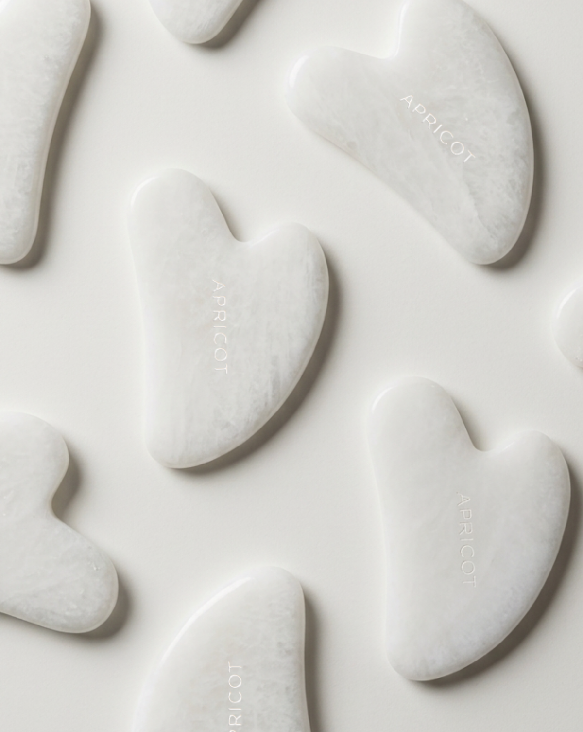 Gua Sha aus weißer Jade